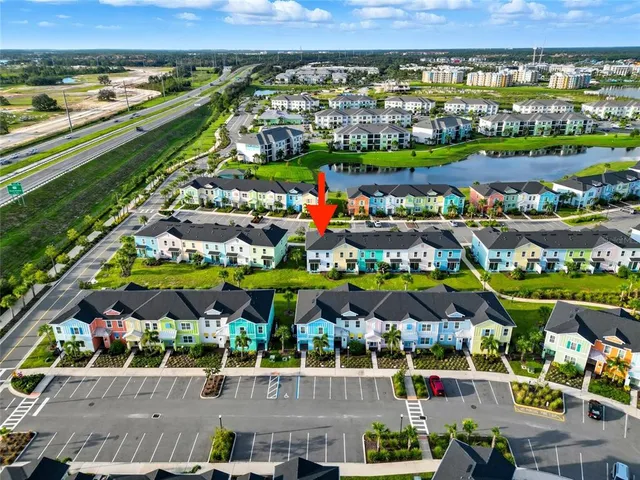 an aerial view of a house with outdoor space