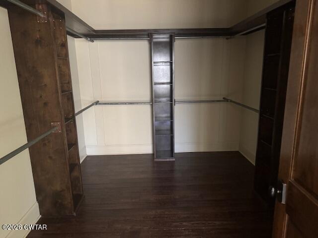 4735 Beech Bluff Road Beech Bluff, TN 38313 - Photo 11 of 18 a view of an empty room with wooden floor and a window