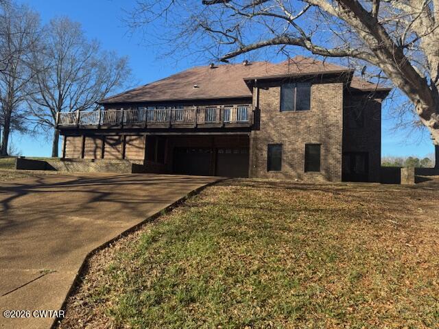 4735 Beech Bluff Road Beech Bluff, TN 38313 - Photo 2 of 18 a front view of a house with a yard