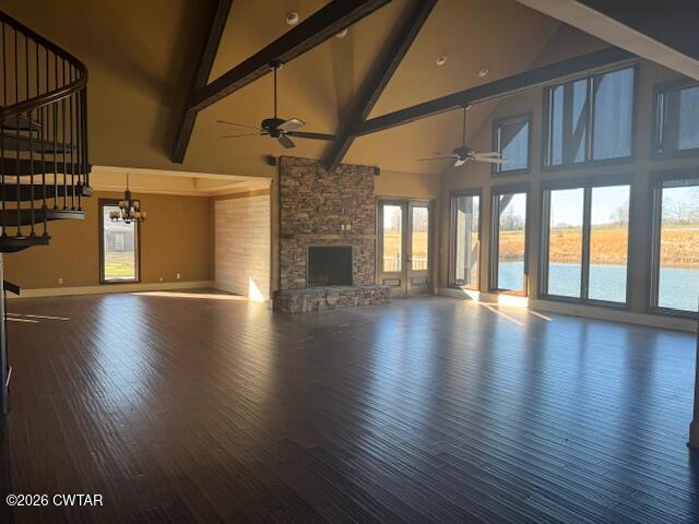 4735 Beech Bluff Road Beech Bluff, TN 38313 - Photo 5 of 18 an empty room with wooden floor and a fireplace