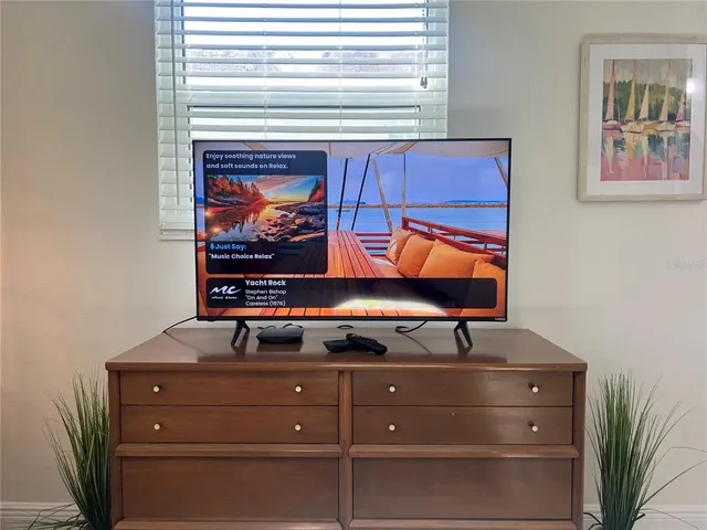 a room with furniture and mirror