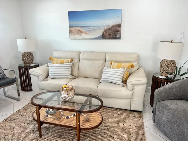 a living room with furniture and a couch