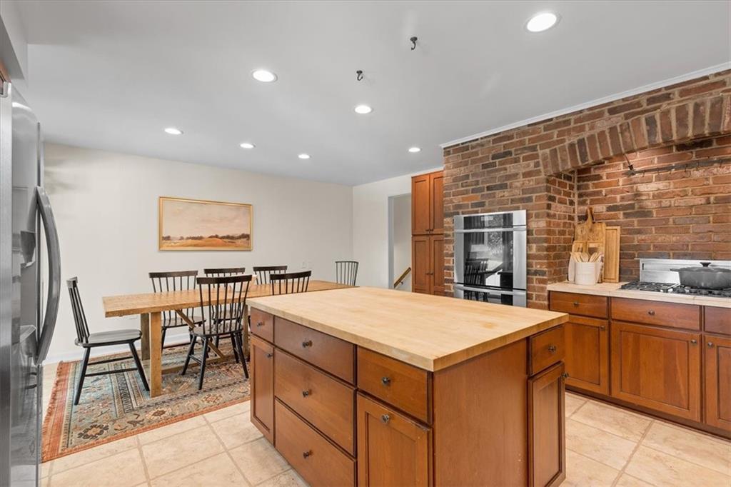 2603 Glenchester Road Wexford, PA 15090 - Photo 14 of 45 a kitchen with a sink and chairs