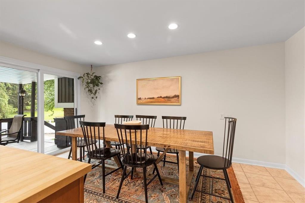 2603 Glenchester Road Wexford, PA 15090 - Photo 16 of 45 a view of a dining room with furniture and a potted plant