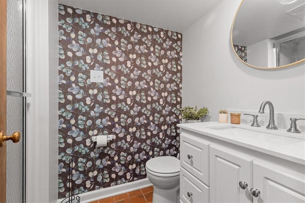2603 Glenchester Road Wexford, PA 15090 - Photo 20 of 45 a bathroom with a sink toilet and a mirror