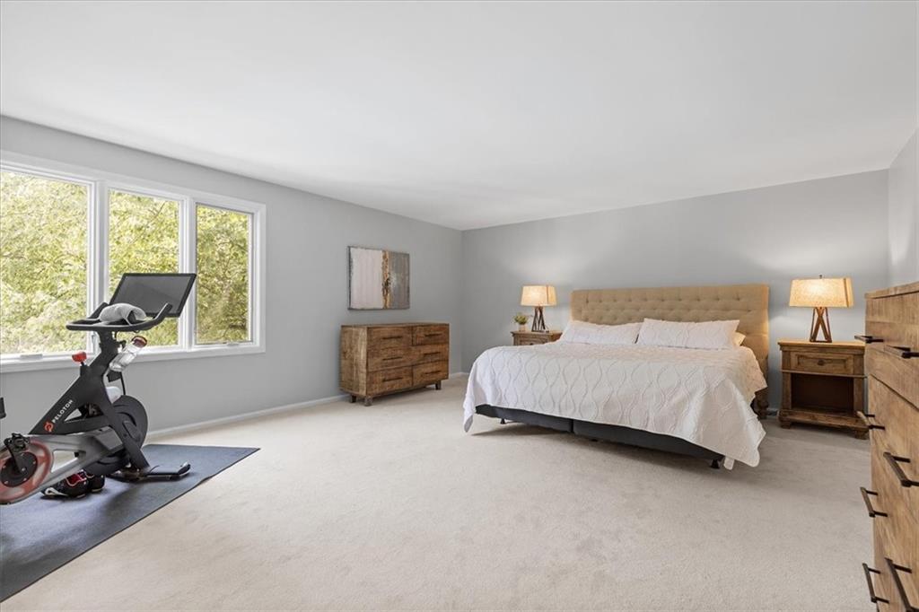 2603 Glenchester Road Wexford, PA 15090 - Photo 23 of 45 a bedroom with bed table and a window