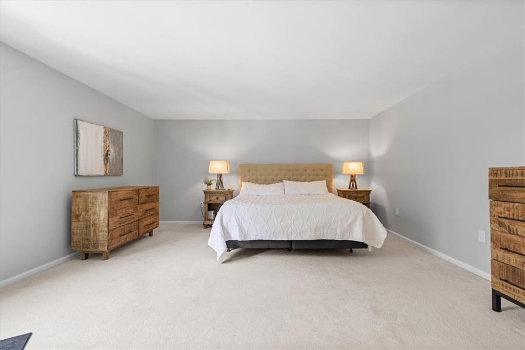 2603 Glenchester Road Wexford, PA 15090 - Photo 24 of 45 a bedroom with a bed and a night stand