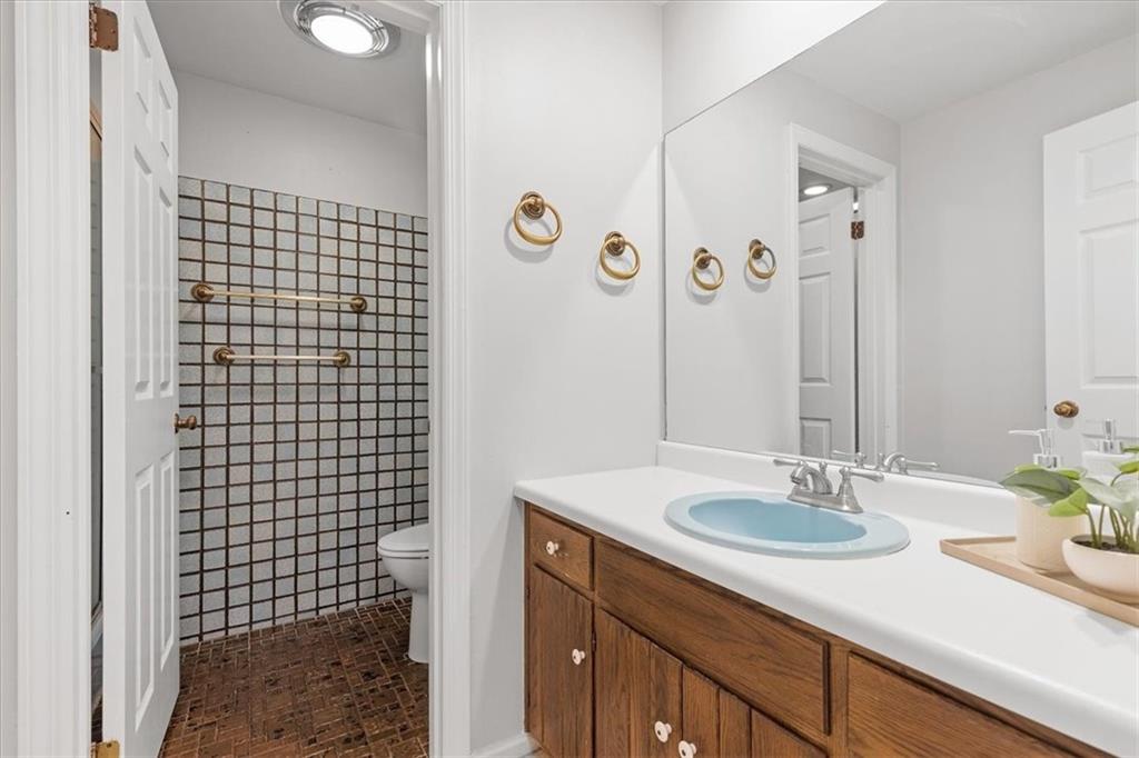 2603 Glenchester Road Wexford, PA 15090 - Photo 31 of 45 a bathroom with a sink and a mirror