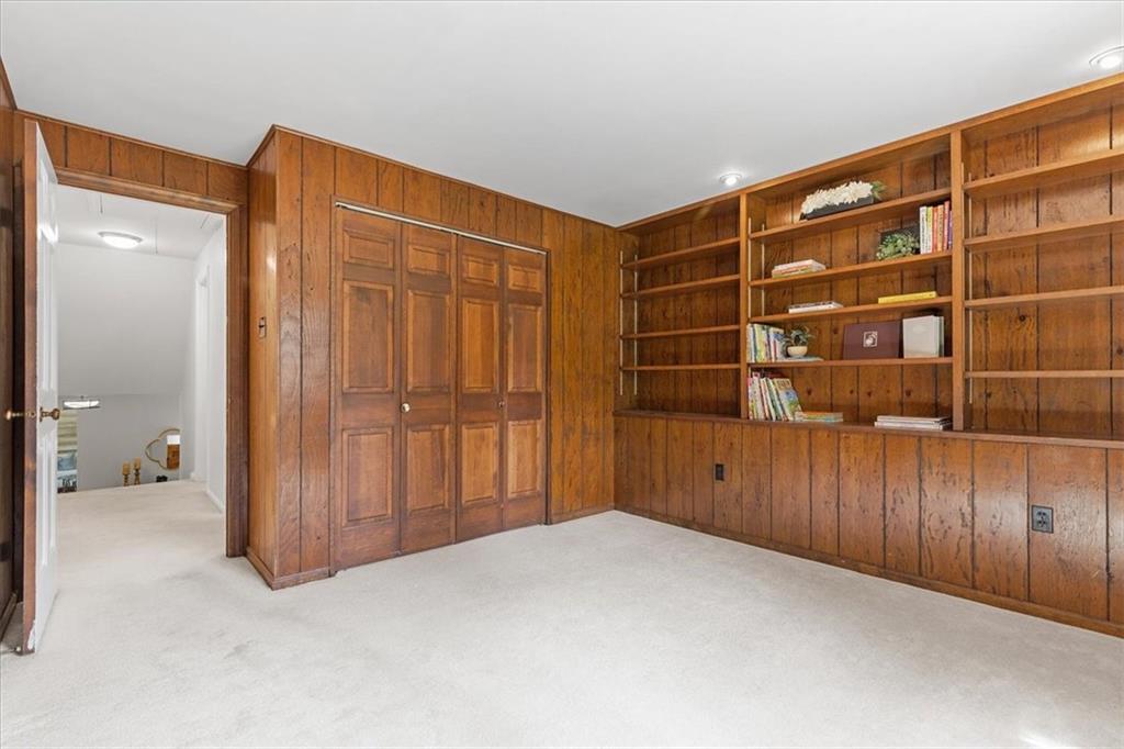 2603 Glenchester Road Wexford, PA 15090 - Photo 33 of 45 a view of an empty room with wooden floor and a bathroom