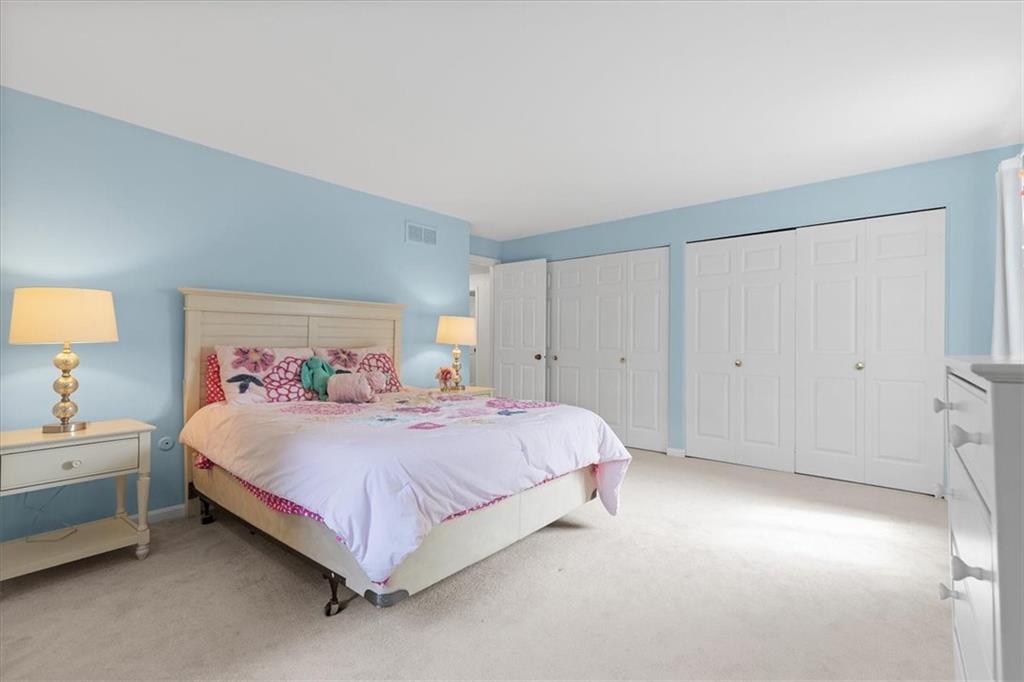 2603 Glenchester Road Wexford, PA 15090 - Photo 35 of 45 a bedroom with a bed and a lamp on dresser