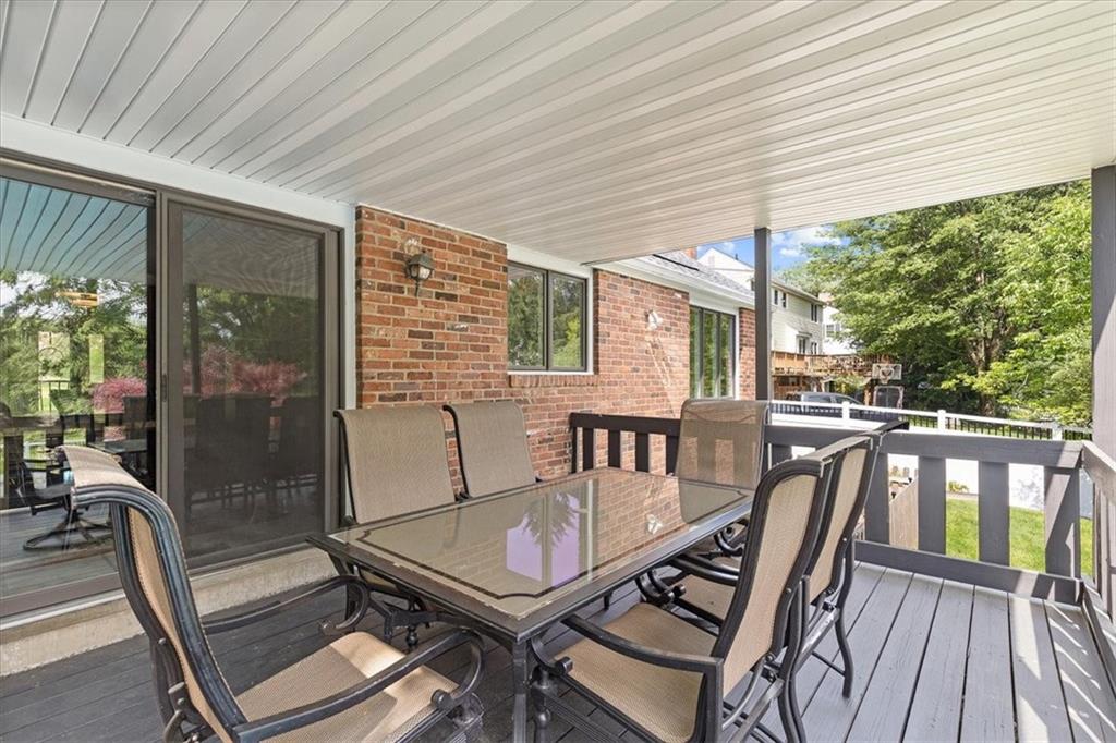 2603 Glenchester Road Wexford, PA 15090 - Photo 36 of 45 a balcony view with a dining table and chairs