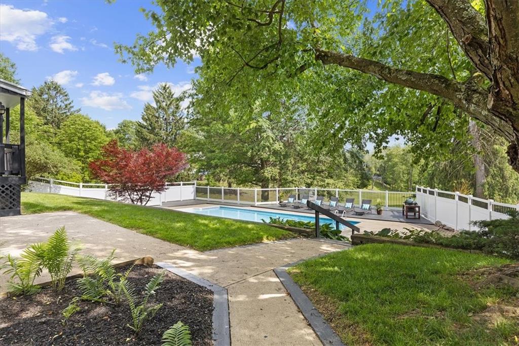 2603 Glenchester Road Wexford, PA 15090 - Photo 37 of 45 a view of backyard with swimming pool and green space