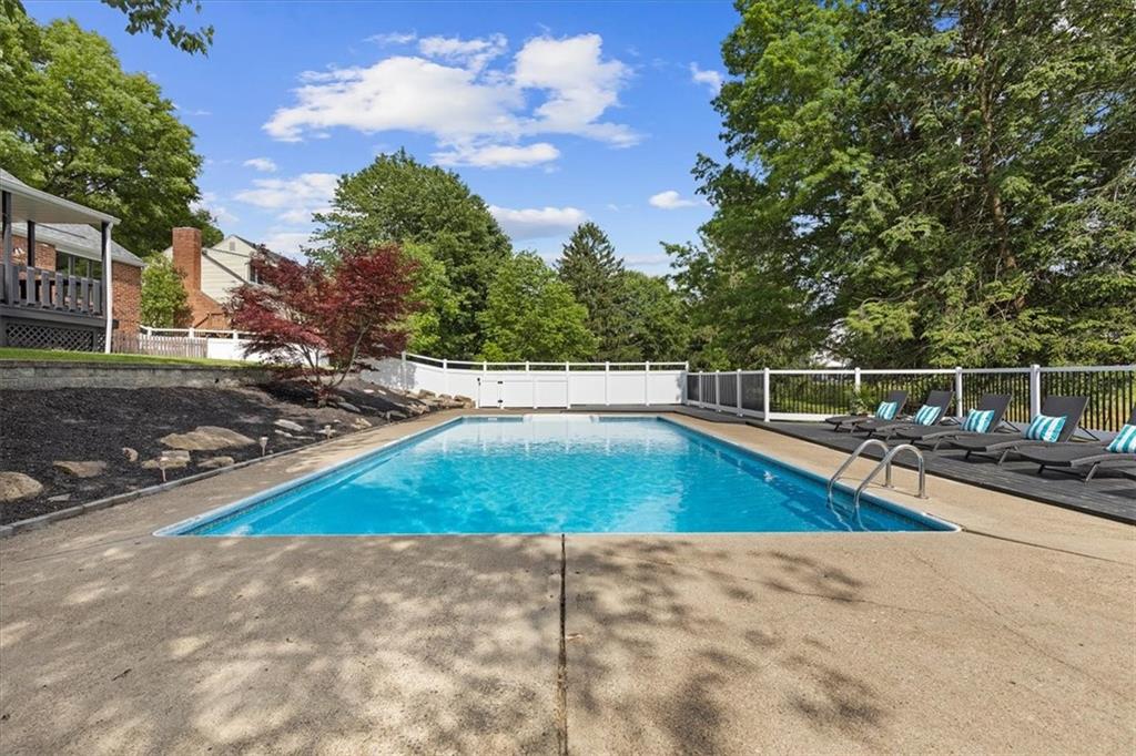 2603 Glenchester Road Wexford, PA 15090 - Photo 42 of 45 a view of a swimming pool with lounge chair