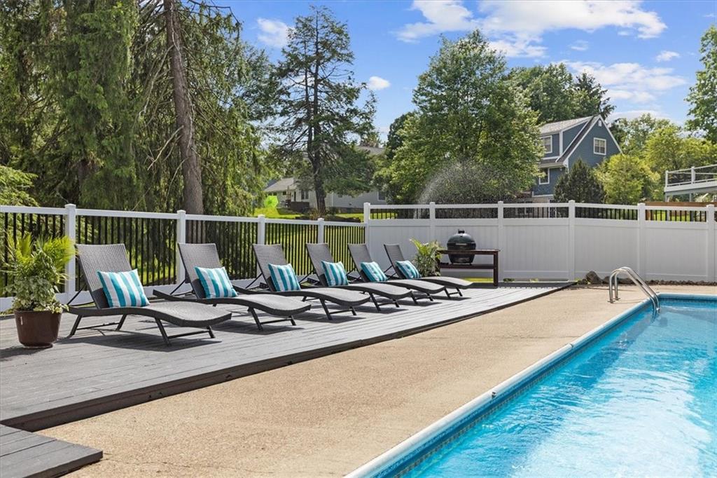 2603 Glenchester Road Wexford, PA 15090 - Photo 43 of 45 a view of swimming pool with chairs and wooden bench
