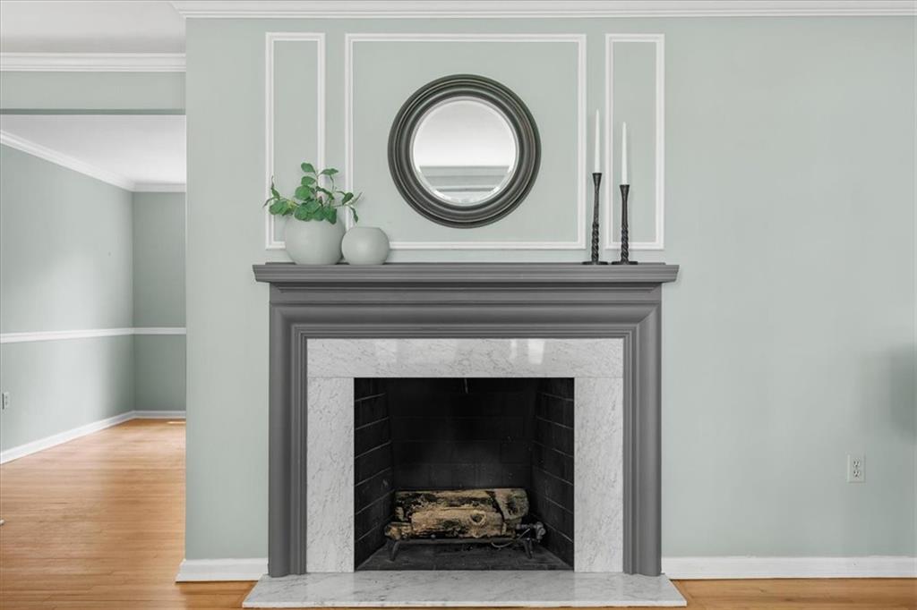 2603 Glenchester Road Wexford, PA 15090 - Photo 8 of 45 a living room with a fireplace and a wooden floor