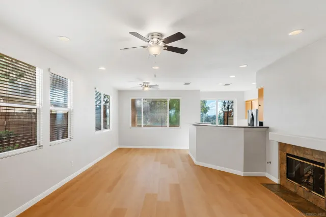 a view of livingroom with furniture window and wooden floor