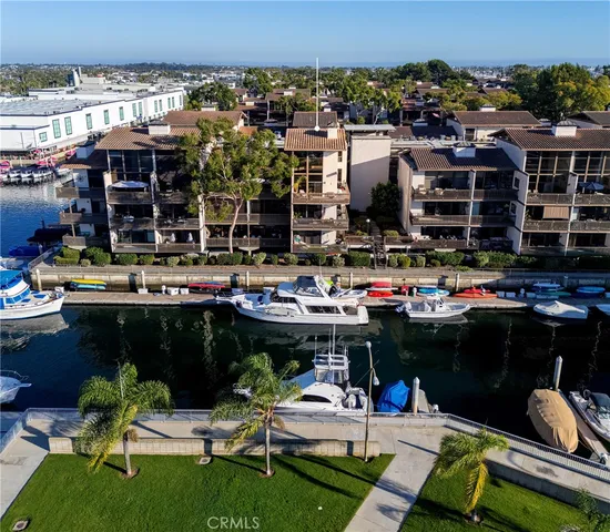 a view of a chairs and table in a backyard