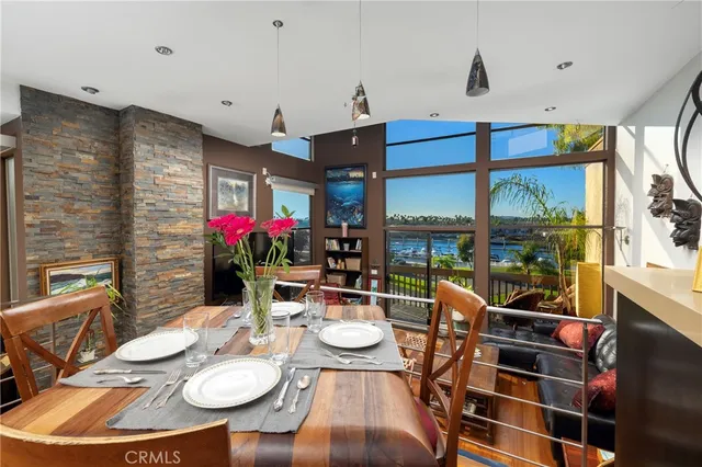 a outdoor dining space with furniture and window
