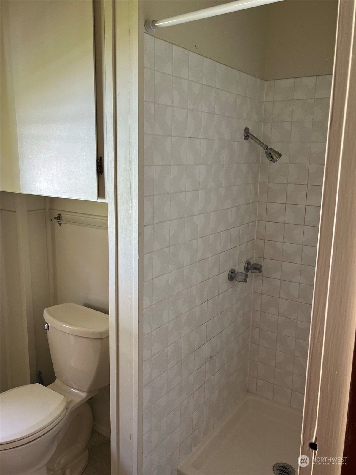 509 Spring Street Camano Island, WA 98282 - Photo 17 of 28 a white toilet sitting next to a shower