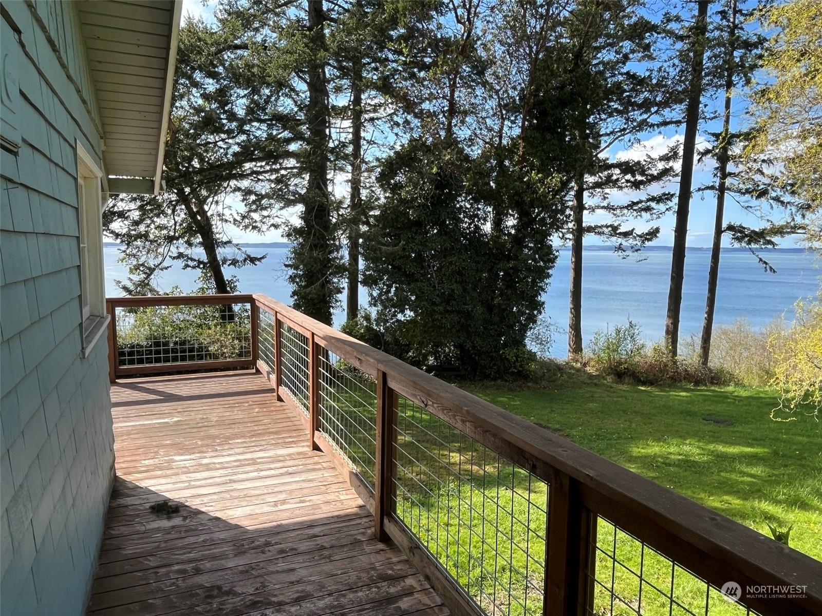 509 Spring Street Camano Island, WA 98282 - Photo 20 of 28 a view of a balcony with yard