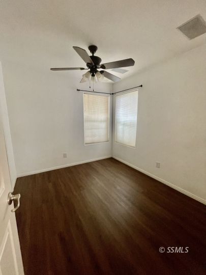 1304 South McCall Street Ridgecrest, CA 93555 - Photo 15 of 22 wooden floor in an empty room