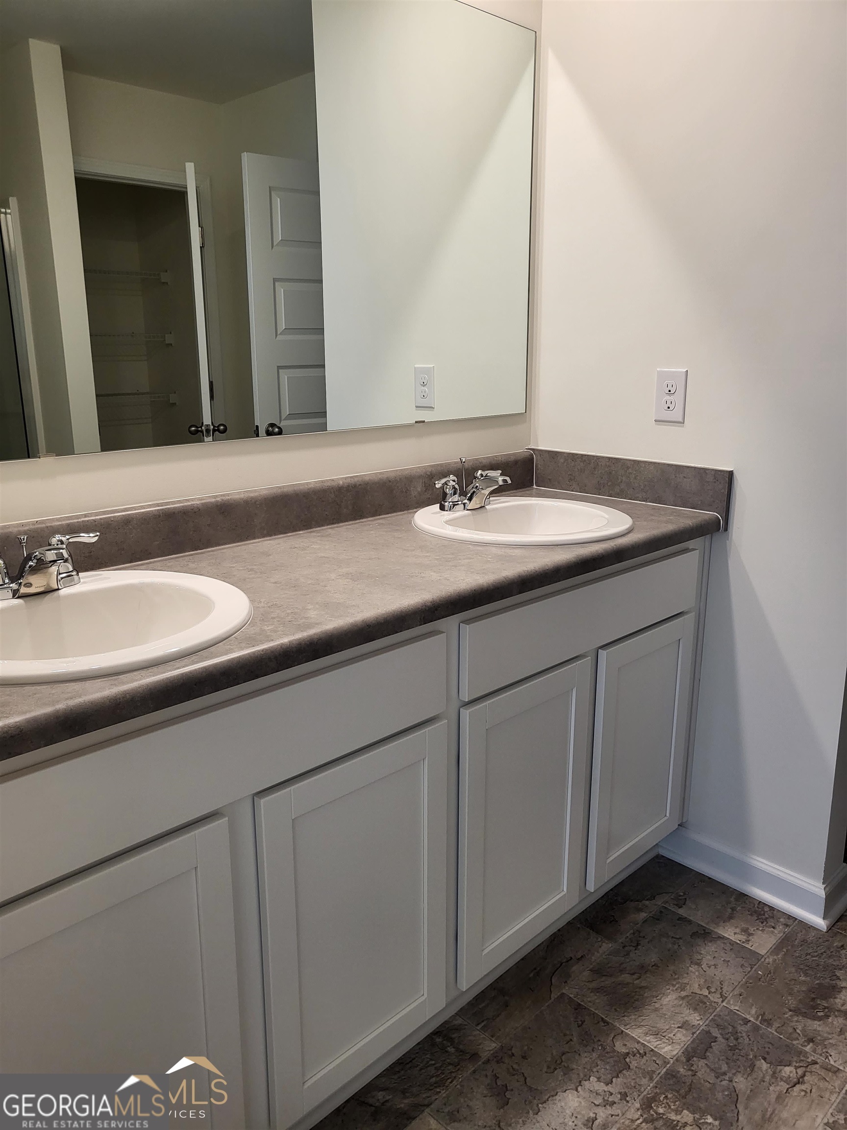 839 Taurus Drive Stockbridge, GA 30281 - Photo 13 of 27 a bathroom with a sink and a mirror
