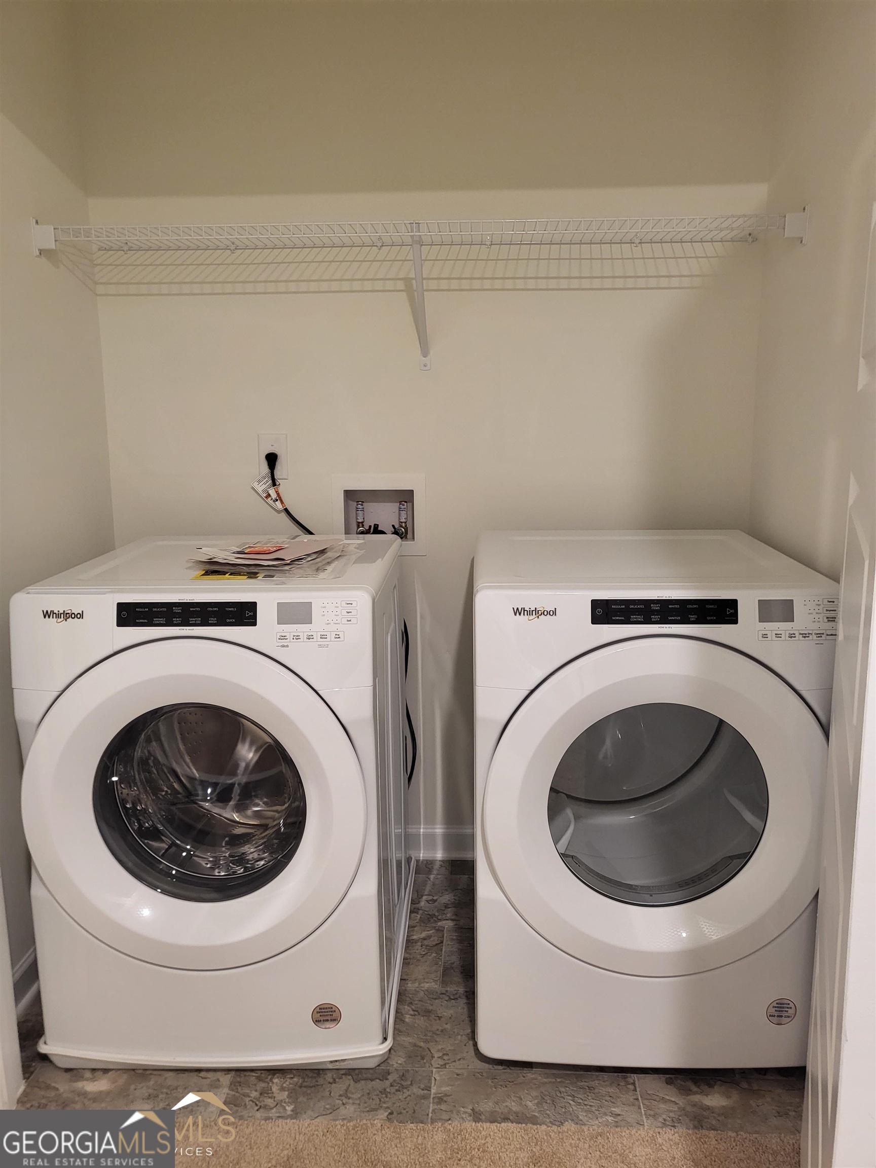 839 Taurus Drive Stockbridge, GA 30281 - Photo 19 of 27 a utility room with dryer and washer