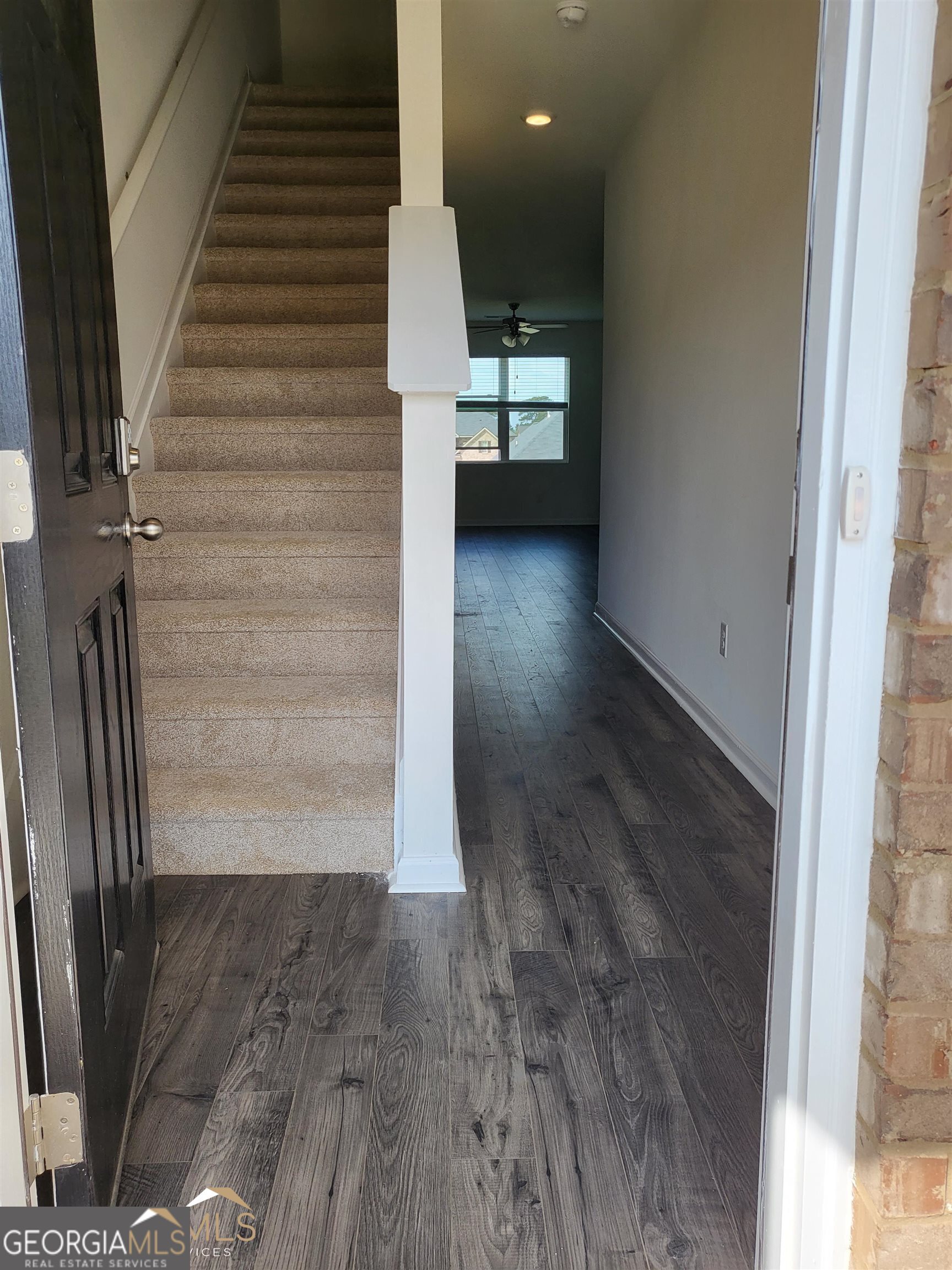 839 Taurus Drive Stockbridge, GA 30281 - Photo 2 of 27 a view of entryway and hall with wooden floor