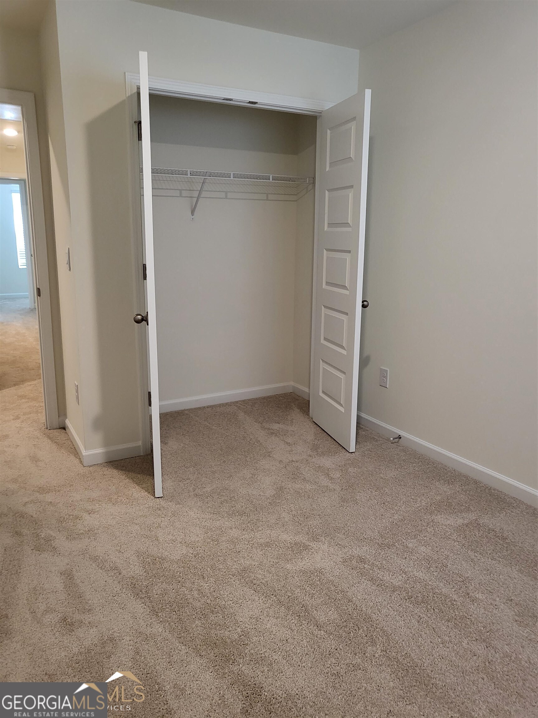 839 Taurus Drive Stockbridge, GA 30281 - Photo 22 of 27 an empty room with closet area