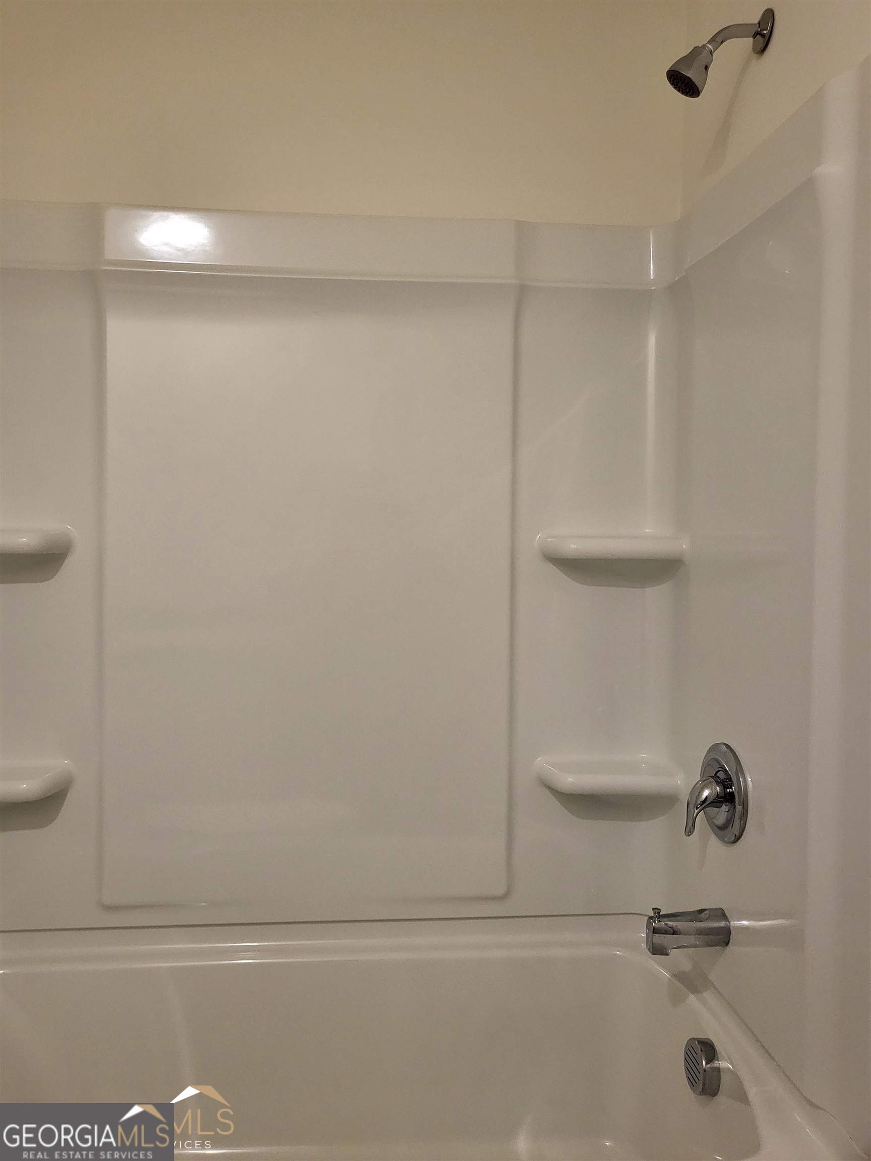 839 Taurus Drive Stockbridge, GA 30281 - Photo 24 of 27 a bathroom with a bathtub