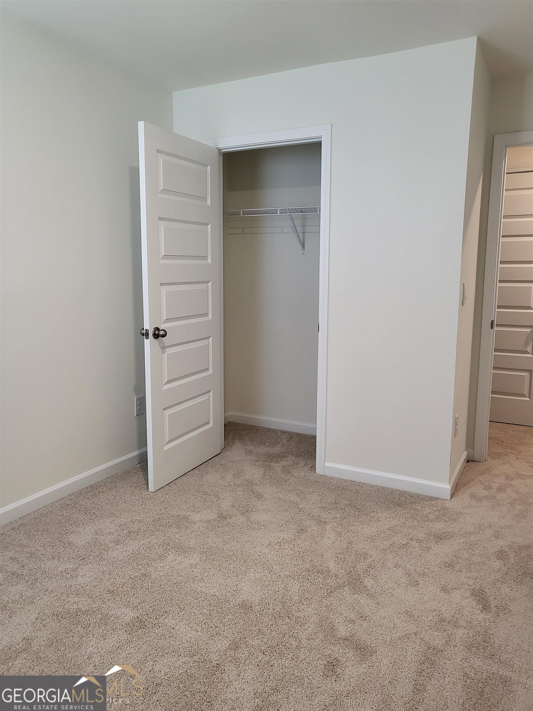 839 Taurus Drive Stockbridge, GA 30281 - Photo 25 of 27 an empty room with closet