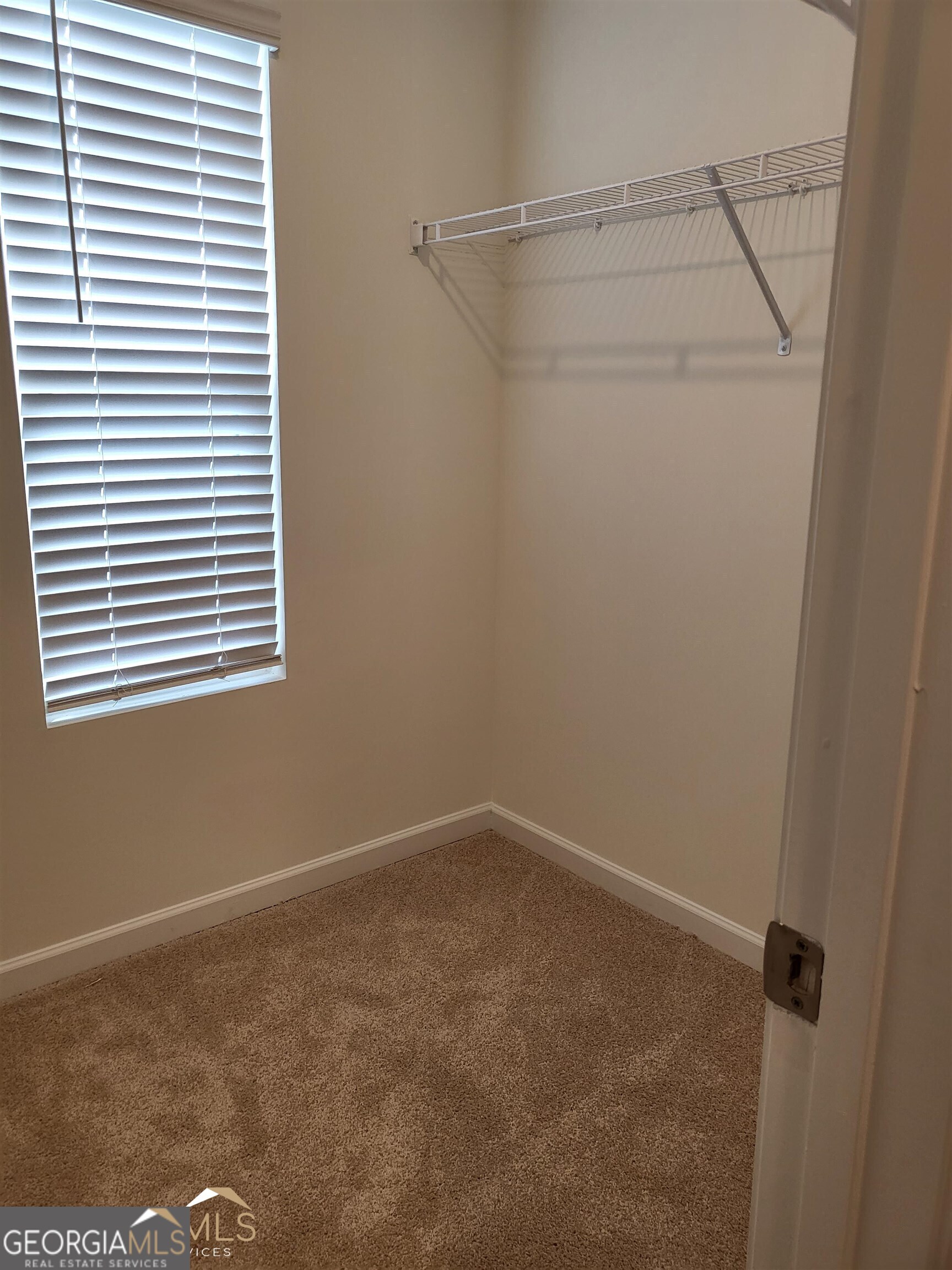 839 Taurus Drive Stockbridge, GA 30281 - Photo 10 of 27 a view of a room that has a window in it