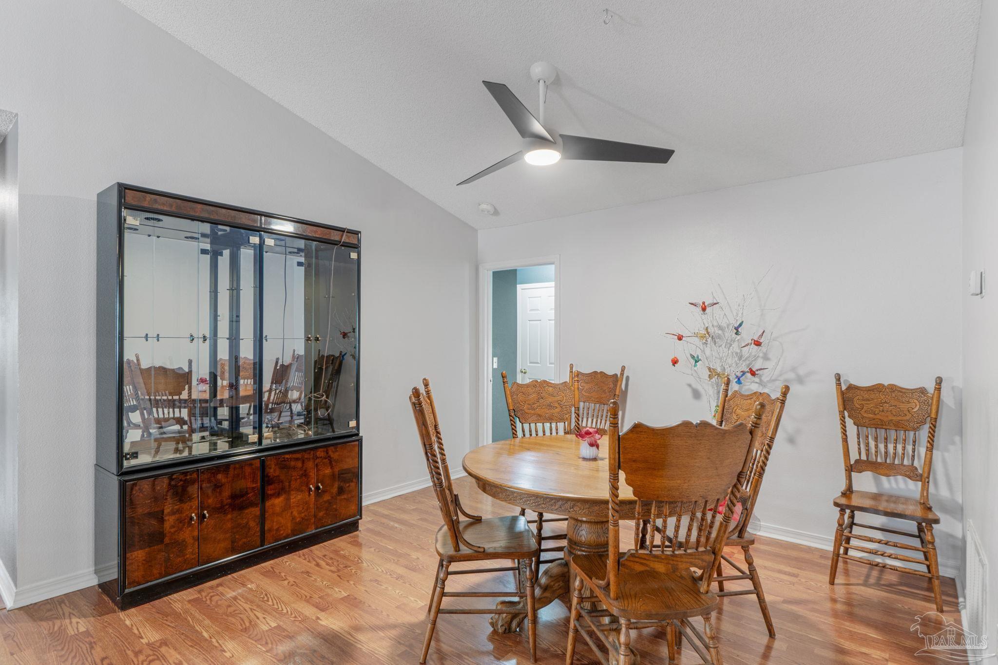 1739 Ivalea Circle Navarre, FL 32566 - Photo 11 of 46 a view of a dining room with furniture