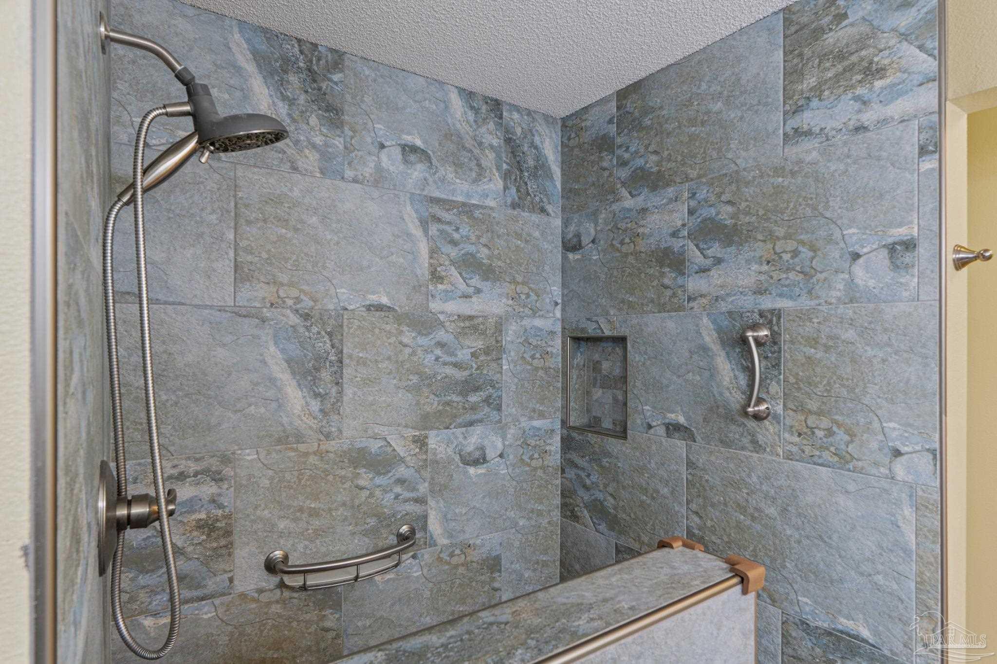 1739 Ivalea Circle Navarre, FL 32566 - Photo 38 of 46 a bathroom with a shower