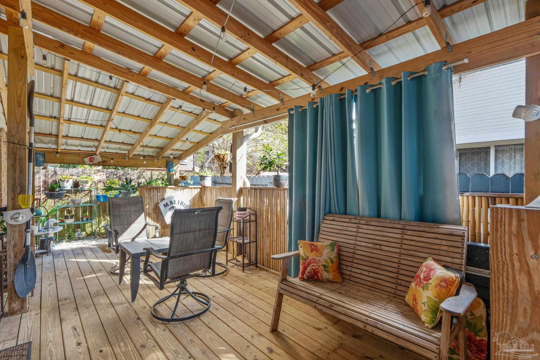 1739 Ivalea Circle Navarre, FL 32566 - Photo 44 of 46 a view of a patio with wooden floor