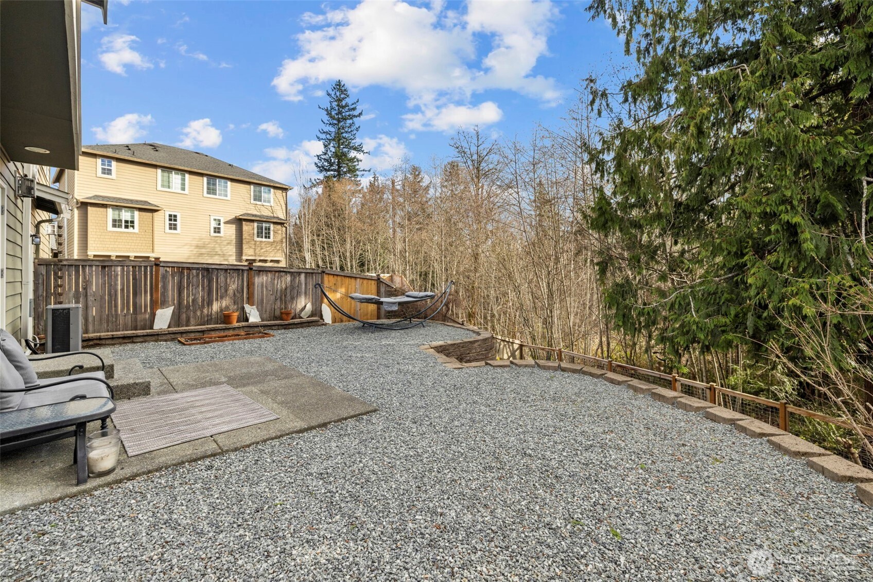 37523 Southeast Fury Street Snoqualmie, WA 98065 - Photo 24 of 30 a view of a house with backyard and sitting area