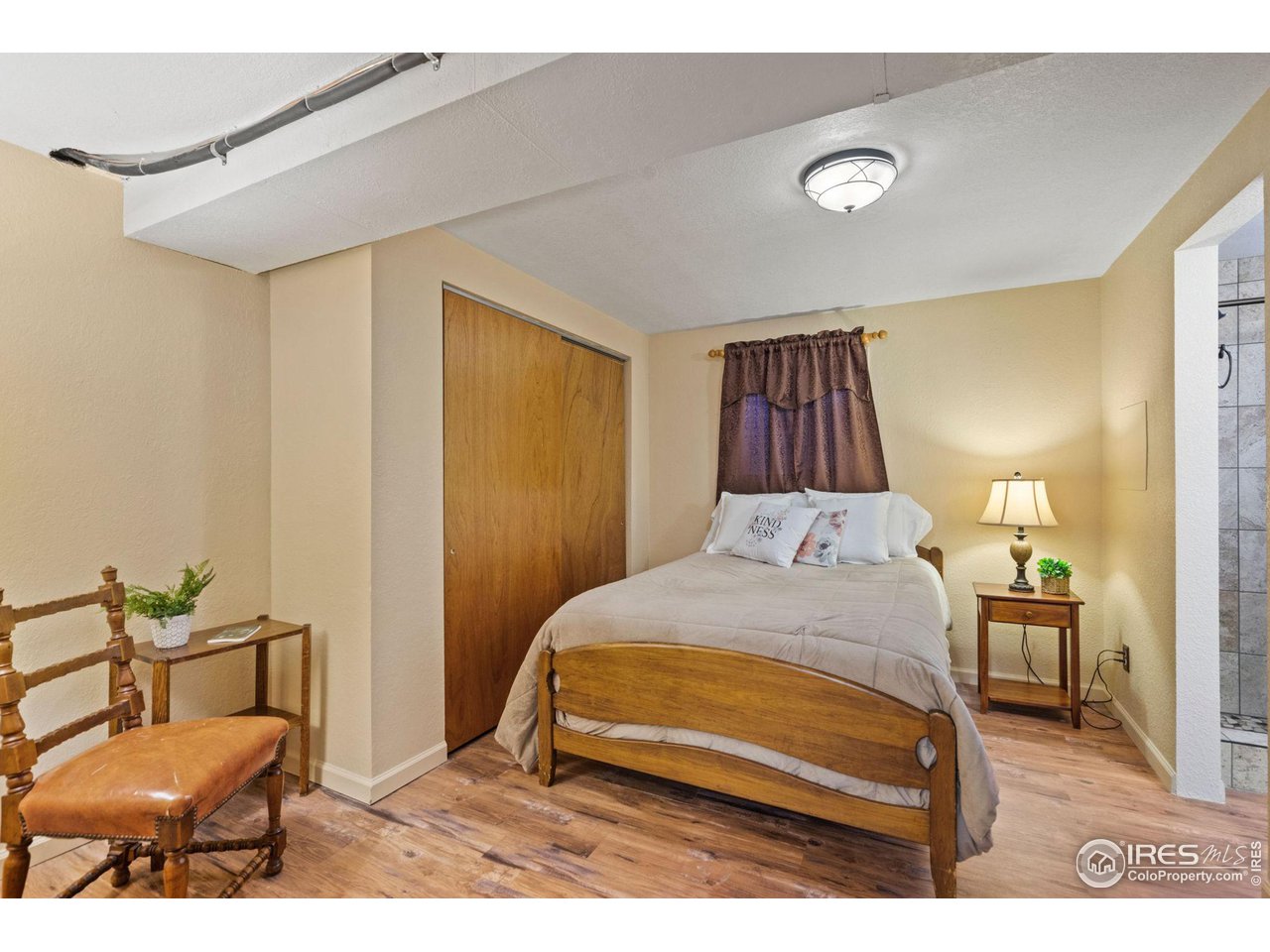 2 Spruce Court Windsor, CO 80550 - Photo 16 of 31 Nice new laminate floors