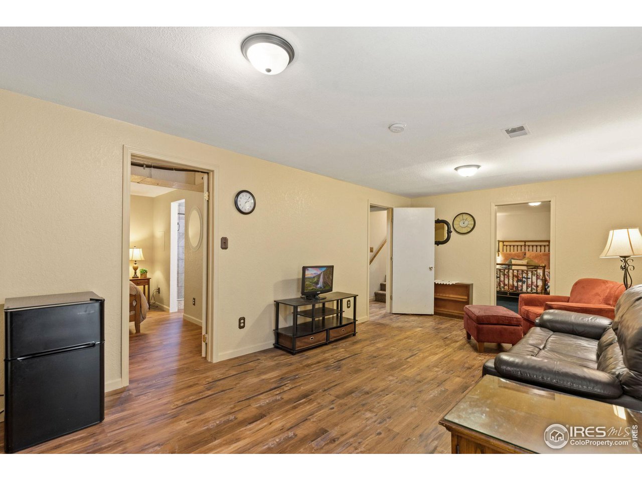 2 Spruce Court Windsor, CO 80550 - Photo 18 of 31 Basement family room, also makes a great roomate or multigenerational living space