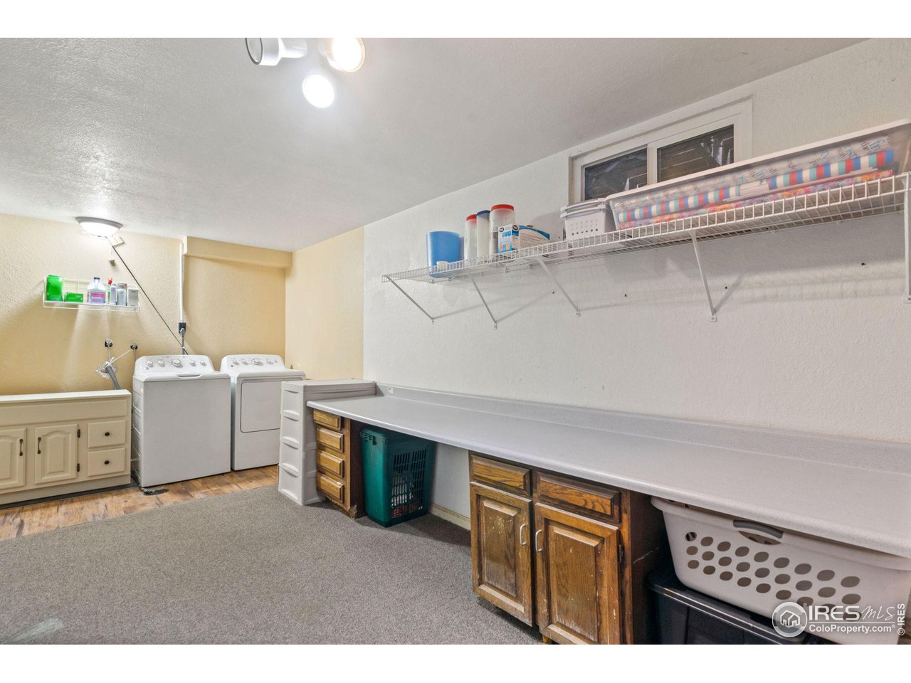 2 Spruce Court Windsor, CO 80550 - Photo 21 of 31 Laundry room and lots of storage space