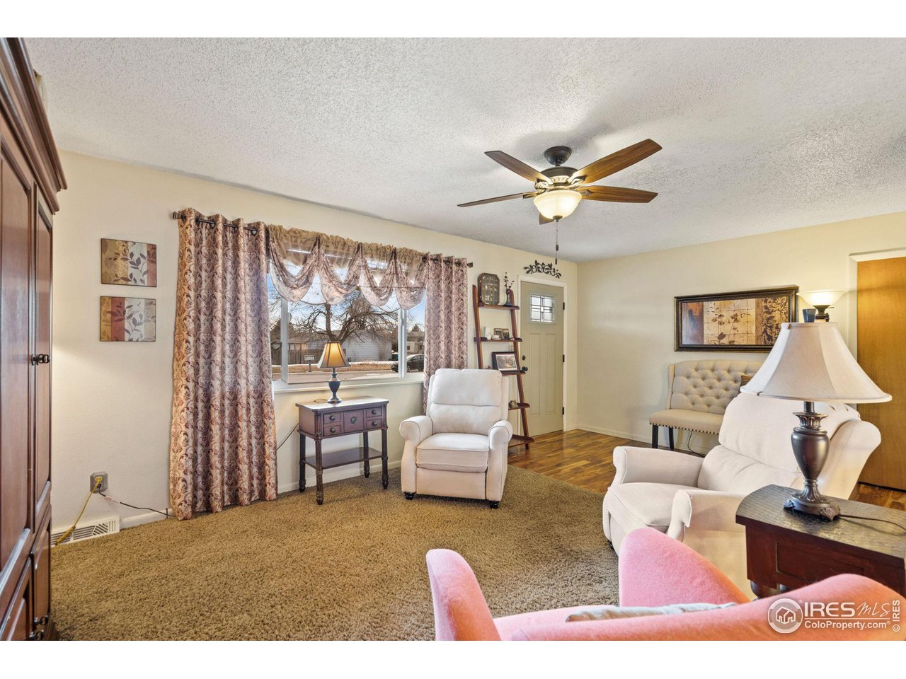 2 Spruce Court Windsor, CO 80550 - Photo 3 of 31 Warm entry and living room