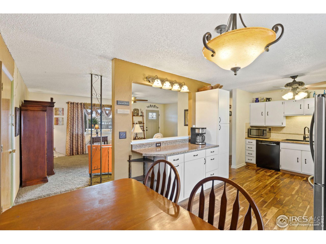 2 Spruce Court Windsor, CO 80550 - Photo 9 of 31 Addtional new cabinets and counter top for extra space
