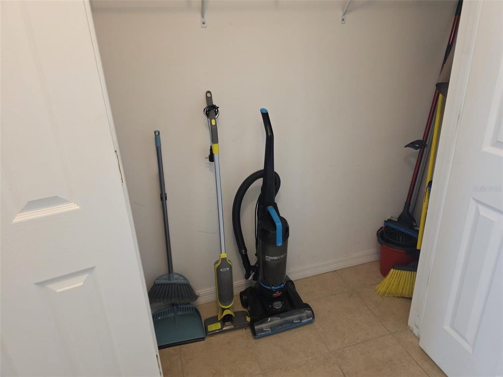 5160 Ambergris Loop Kissimmee, FL 34746 - Photo 33 of 38 a bathroom with a sink and a mirror