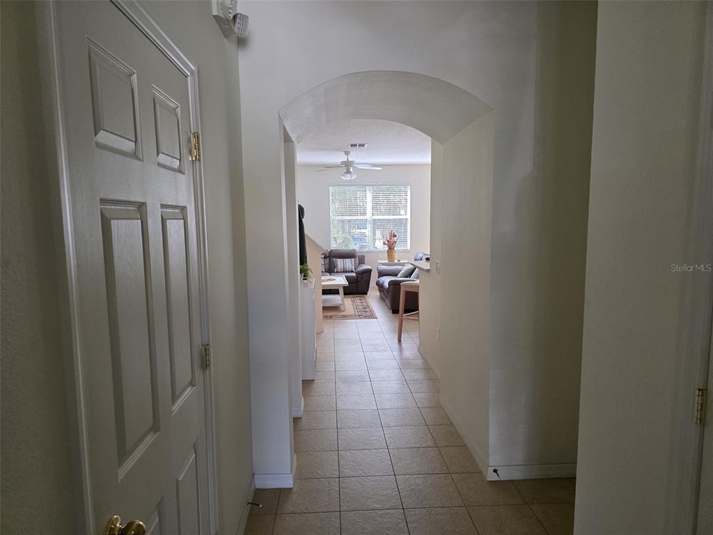 5160 Ambergris Loop Kissimmee, FL 34746 - Photo 4 of 38 a lobby with furniture and a window