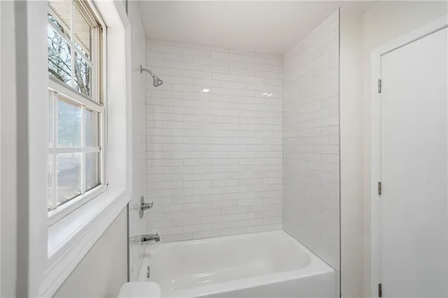 a bathroom with a bathtub