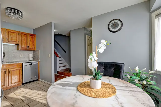 a view of a balcony with furniture