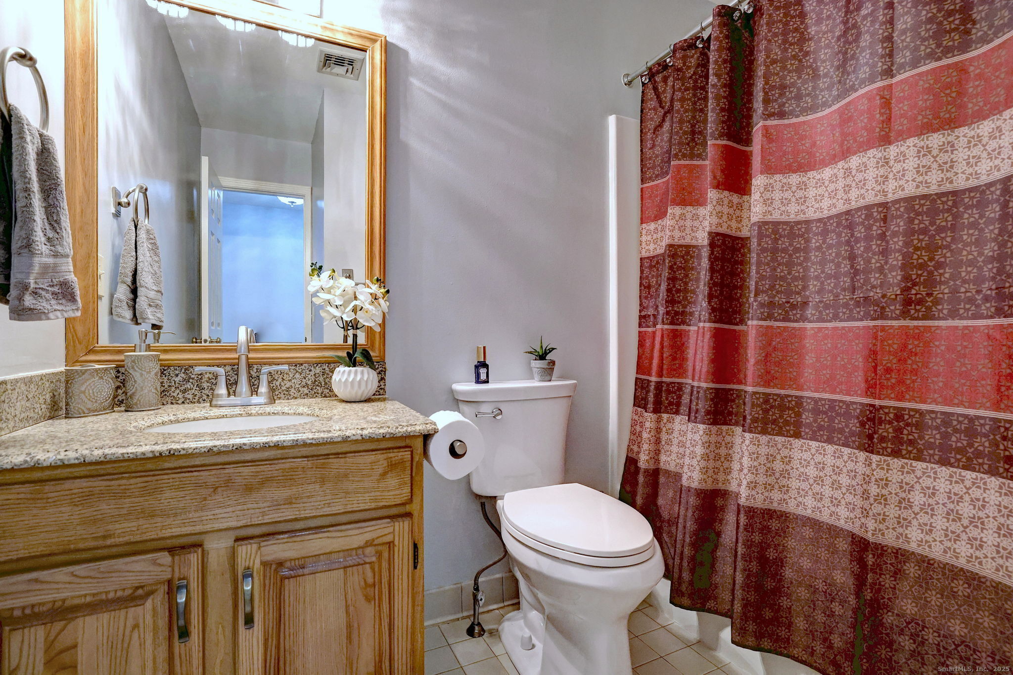 2838 Whitney Avenue, Unit 2 Hamden, CT 06518 - Photo 24 of 26 a bathroom with a sink a toilet and shower