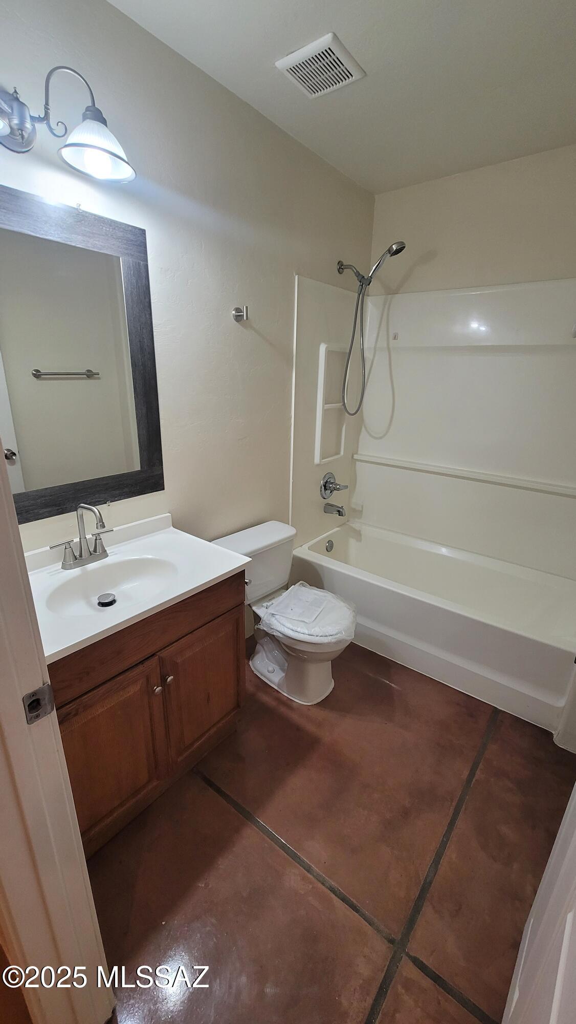 533 West San Xavier Road Tucson, AZ 85713 - Photo 6 of 21 a bathroom with a double vanity sink mirror and toilet