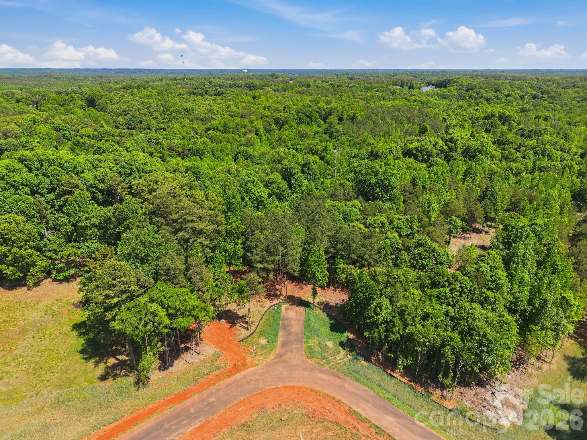 5922 Bentley Ridge Drive, Unit 6 Davidson, NC 28036 - Photo 2 of 7 a view of a yard with an outdoor space