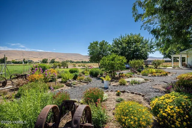 an aerial view of ocean with residential houses with outdoor space