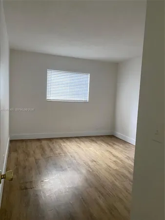 an empty room with a workbench